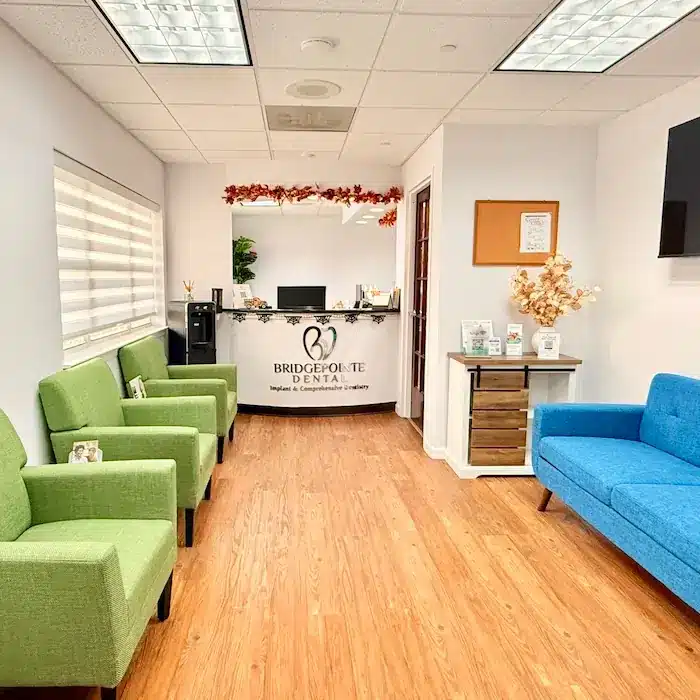 Modern and comfortable dental office waiting room at Bridgepointe Dental Studio in Metuchen, NJ.