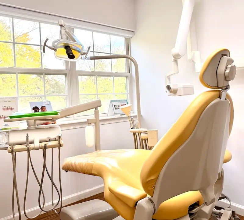 Dental chair with natural light and window view at Bridgepointe Dental Studio in Metuchen NJ